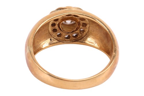 Lot A diamond single stone ring, the raised collet-...