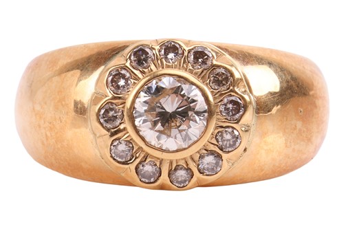 Lot A diamond single stone ring, the raised collet-...