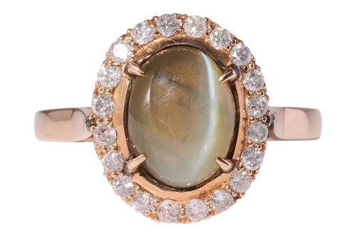 Lot A chyrsoberyl and diamond cluster ring,...