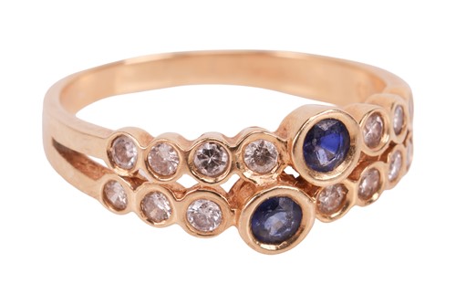 Lot A sapphire and diamond-set ring, the two...