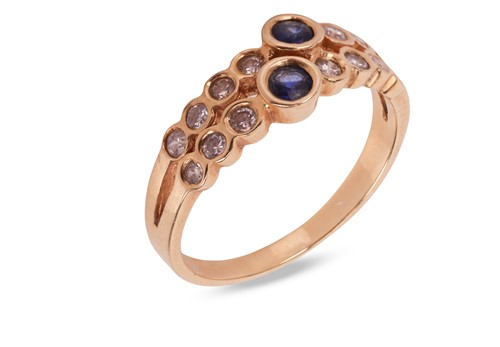 Lot A sapphire and diamond-set ring, the two...