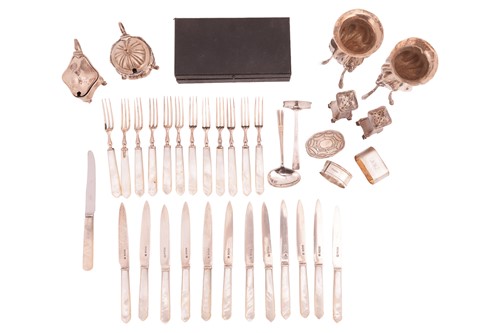 Lot A set of twelve pairs of Mother of pearl...