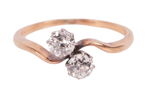Lot An old-cut diamond Toi-et-Moi ring, with a...