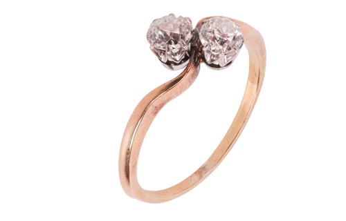 Lot An old-cut diamond Toi-et-Moi ring, with a...