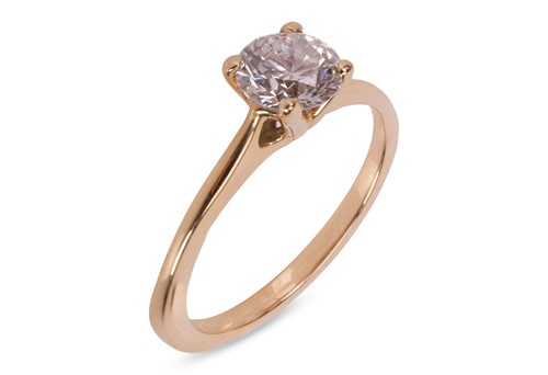 Lot A diamond solitaire ring, featuring a central...