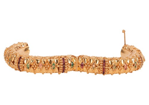 Lot An enamelled bangle, the hinged bangle with...