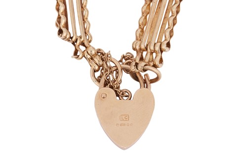 Lot A 9ct gold gate link bracelet, to a heart...