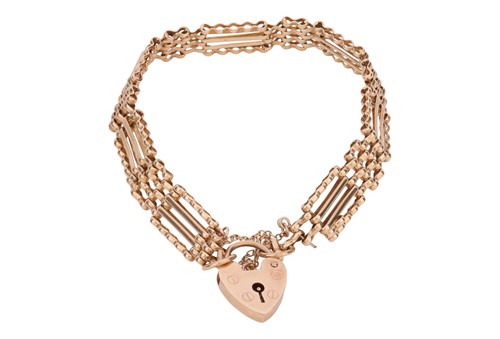 Lot A 9ct gold gate link bracelet, to a heart...