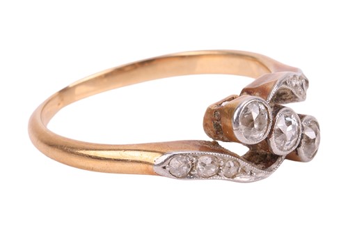 Lot An early 20th century diamond crossover ring,...