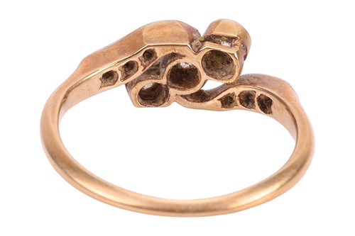 Lot An early 20th century diamond crossover ring,...