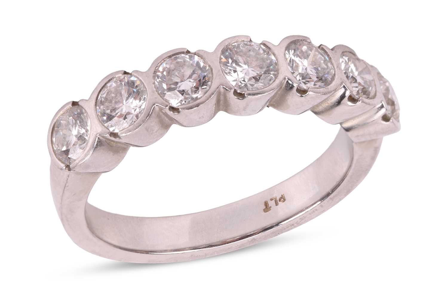 Lot A diamond seven stone half eternity ring,...