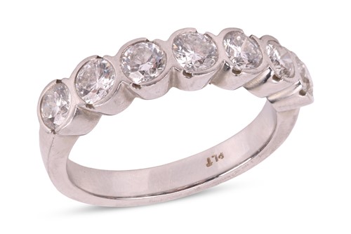Lot A diamond seven stone half eternity ring,...