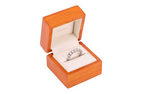 Lot A diamond seven stone half eternity ring,...