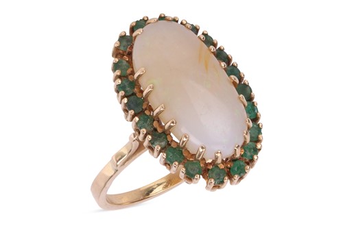 Lot An opal and emerald dress ring, comprising an...