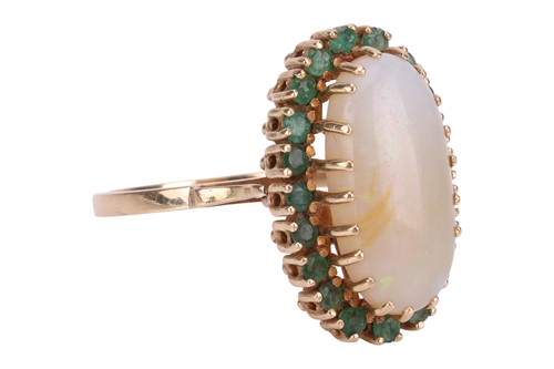 Lot An opal and emerald dress ring, comprising an...