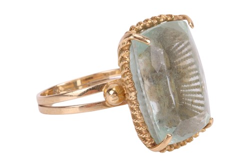 Lot An aquamarine cocktail ring, comprising a...