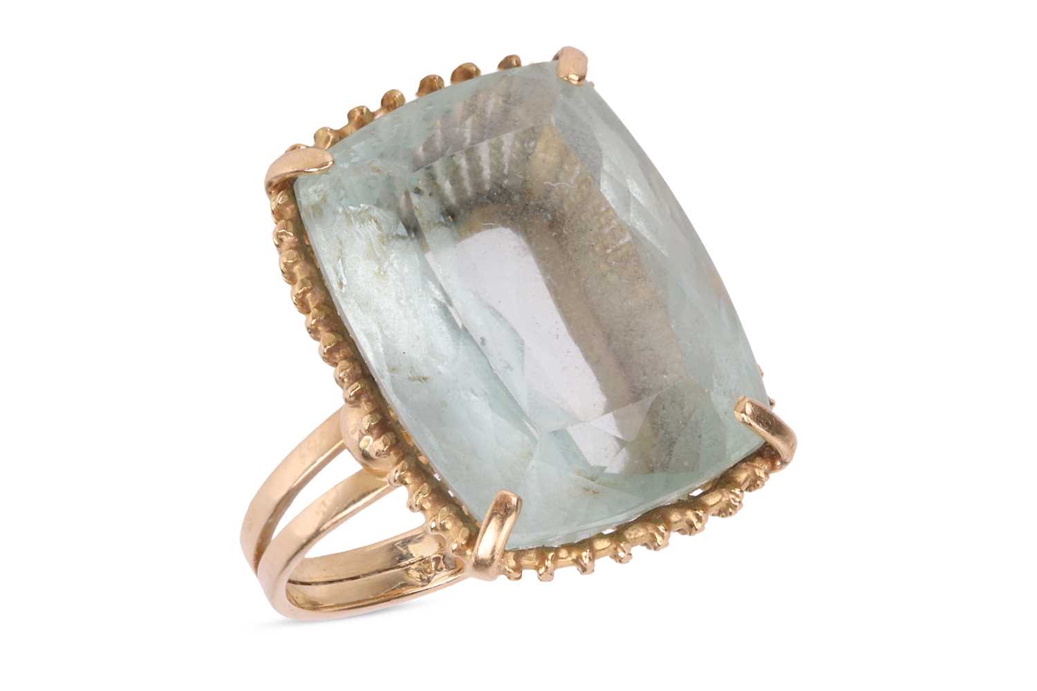 Lot An aquamarine cocktail ring, comprising a...
