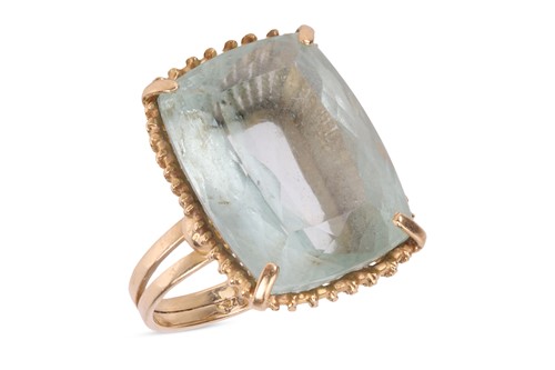 Lot An aquamarine cocktail ring, comprising a...
