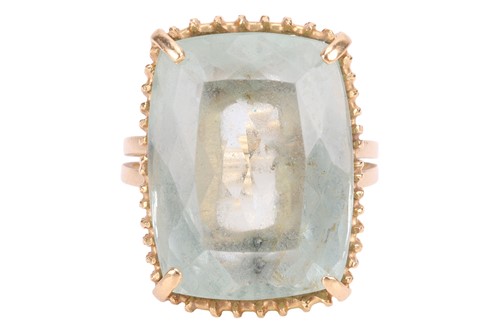 Lot An aquamarine cocktail ring, comprising a...