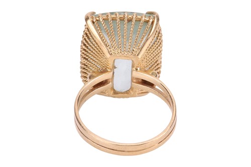 Lot An aquamarine cocktail ring, comprising a...