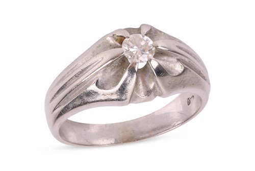 Lot A diamond single stone ring, the round...