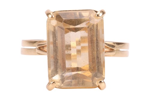 Lot A citrine dress ring, claw-set with a...