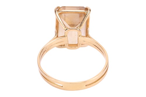 Lot A citrine dress ring, claw-set with a...