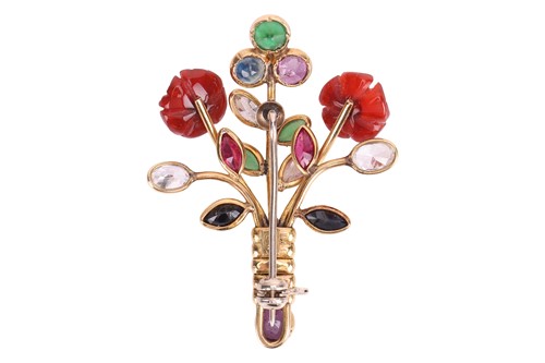 Lot A gem-set floral spray brooch, the stylised...