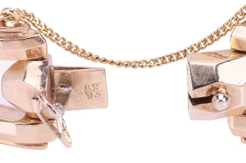 Lot A three-tone link bracelet, comprising hollow...