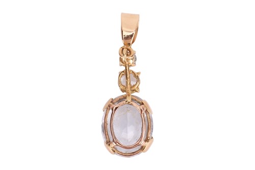 Lot An aquamarine pendant, to contain an oval-cut...