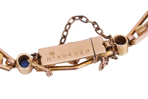 Lot An Edwardian link bracelet set with sapphire...