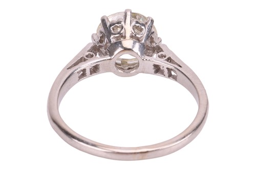 Lot A diamond solitaire ring, centred with a...