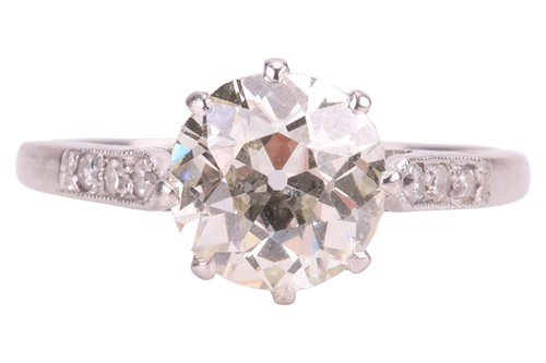 Lot A diamond solitaire ring, centred with a...