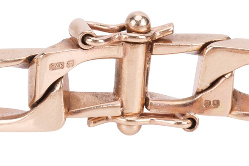 Lot A square curb link bracelet in 9ct gold,...