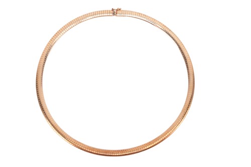 Lot A torque necklace, or tubular design to a...