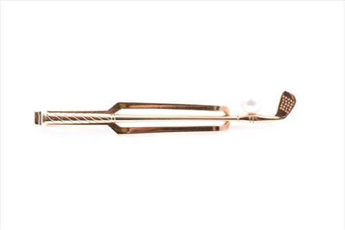 Lot 538 - A yellow metal tie pin set with a Mikimoto...
